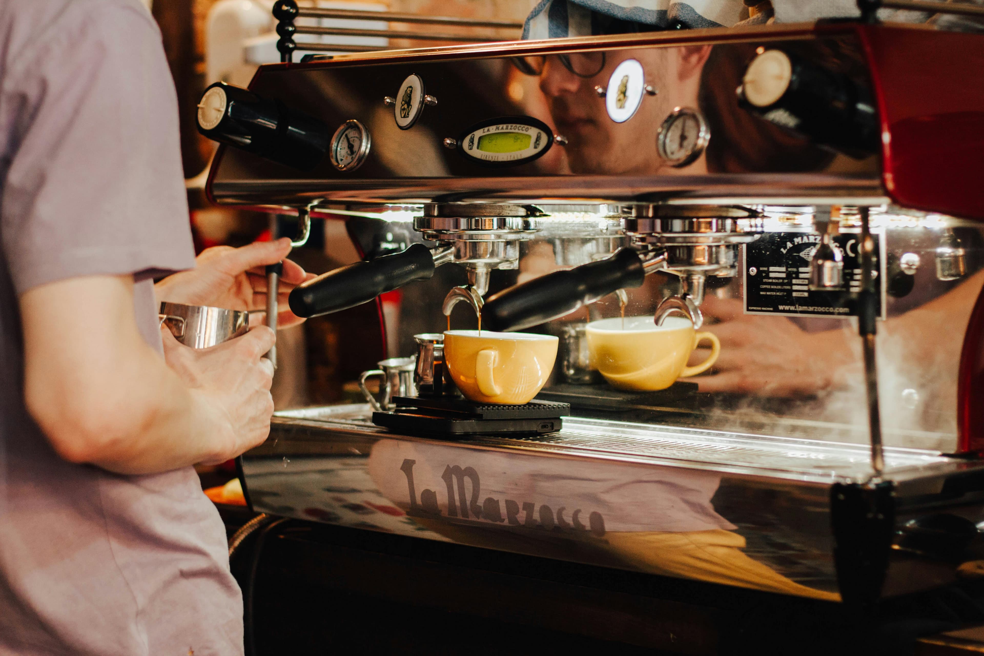 Barista preparing coffee at The Cosy Café